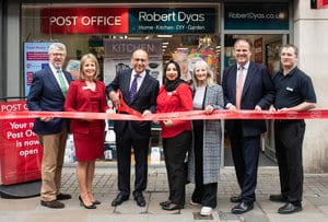 EDITORIAL USE ONLY
Theo Paphitis, Chairman Robert Dyas (3rd left) and Debbie Smith, CEO Post Office Retail (2nd left), join staff to celebrate the official opening of the very first Post Office service inside a Robert Dyas store on the Strand in London. PRESS ASSOCIATION Photo. Picture date: Friday March 15, 2019. Photo credit should read: John Nguyen/PA Wire