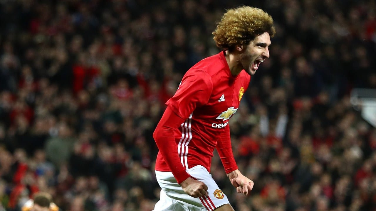 Late Fellaini header condemns Wenger to Old Trafford defeat