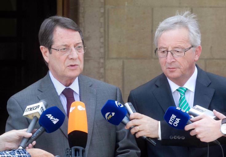 EU Commission President ready to assist in Cyprus reunification effort, Juncker says, congratulating N.Anastasiades