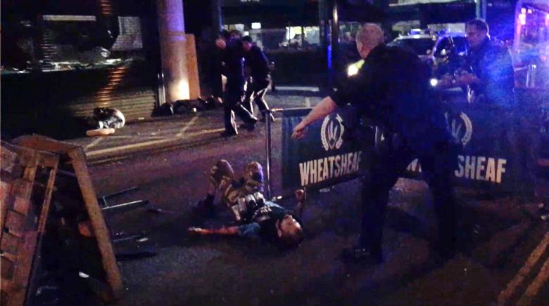 Police arrest three as footage of London Bridge attack appears online