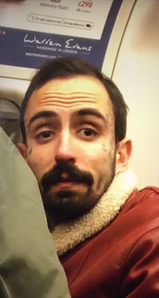 Appeal after woman assaulted after approaching a man and woman engaged in a sexual activity on train