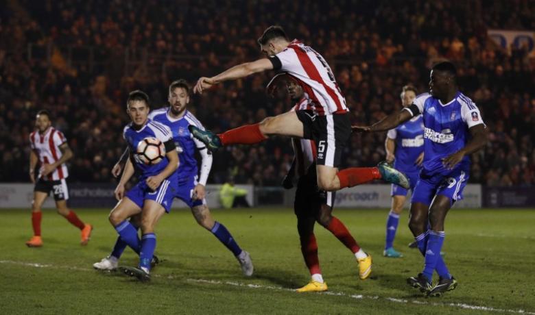 Lincoln and Sutton spring FA Cup surprises, Palace win