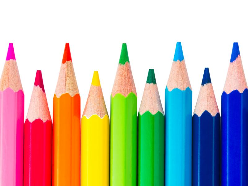 Row of colorful pencils isolated over white background