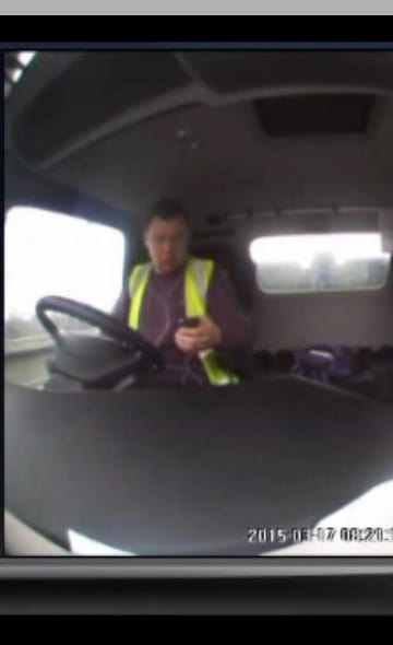 View Video of man using mobile on motorway and causing accident