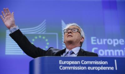 epa05103038 European Commission President Jean-Claude Juncker gestures as he speaks to the media during his first 2016 news conference on the agenda of the EU institutions at the European Commission in Brussels, Belgium, 15 January 2016. Juncker also came back on main topics of the EU's 2015 agenda.  EPA/OLIVIER HOSLET