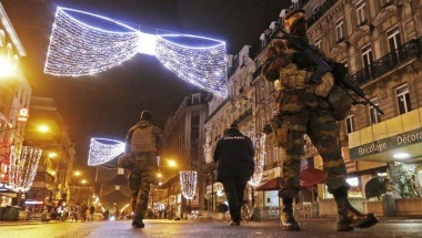 Soldiers patrol streets of Brussels after overnight arrests