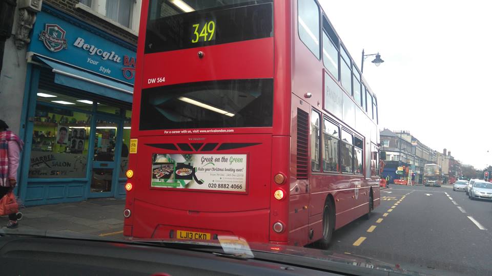Greek on the Green on the buses