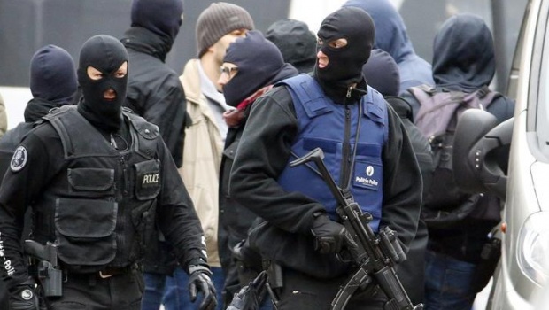 France police raid homes