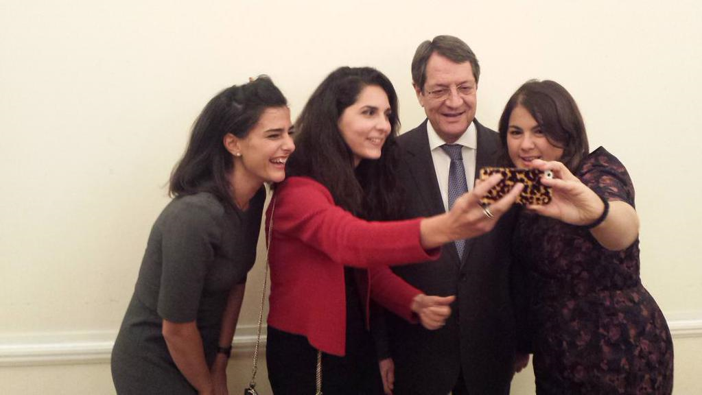 Cypriot President Anastasiades smiles all round with selfie photo