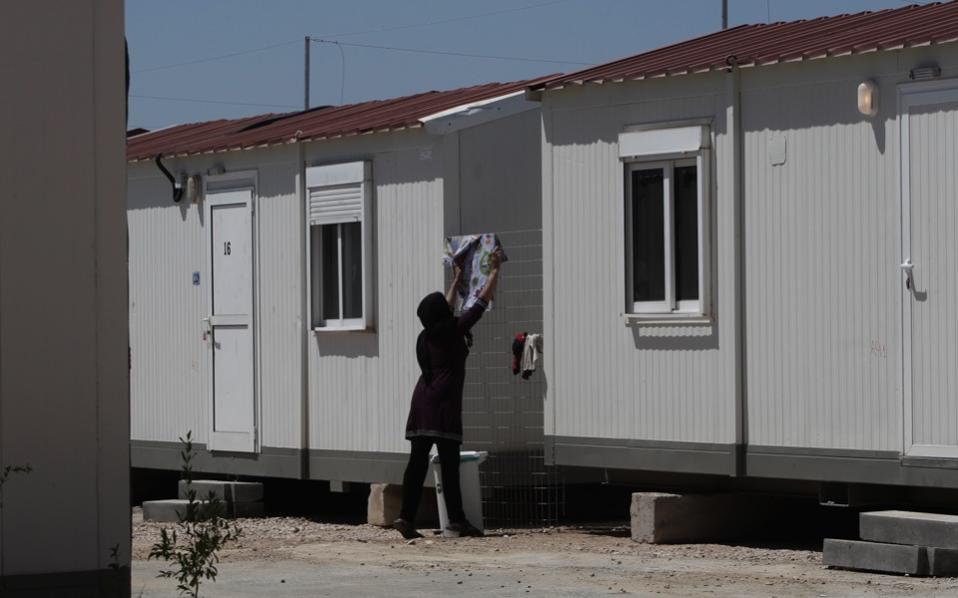 Refugees moved to center at Elaionas near Central Athens in Greece