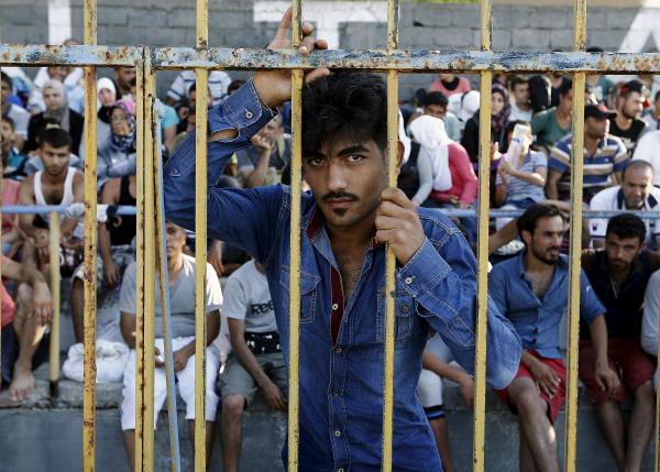 Greek mayor hands out aid as Kos sets up floating migrant centre