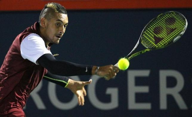 Kyrgios fined, apologises for comment to Wawrinka