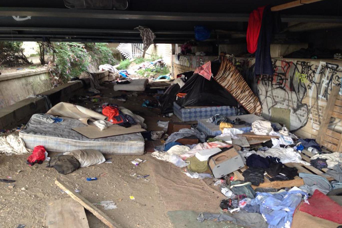 Squalid living homeless camp under North Circular road, Enfield
