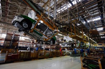 epa04441894 A general view for the assembling plant of the Iranian automobile manufacturing company Iran-Khodro, in Tehran, Iran, 11 October 2014. Iran-Khodro is the leading Iranian vehicle manufacturer that mainly assembles the Iranian brand Samand as well as the French Peugueot for both local market and exports to neighboring countries. The company’s turnover contributes with a major part of the country's non-oil revenue. Despite the international sanctions imposed on Iran due to the country's controversial nuclear program, Iran-Khodro is trying to produce all necessary spare parts by itself.  EPA/ABEDIN TAHERKENAREH