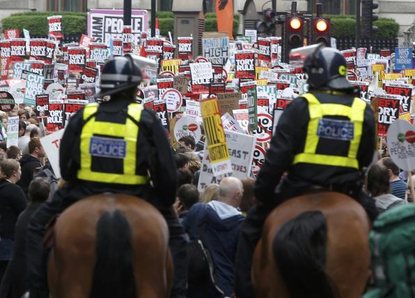 Thousands march in London against new government’s austerity plan