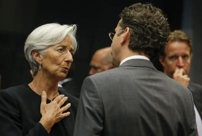epa04806470 Managing Director of the International Monetary Fund (left) Christine Lagarde talks with Dutch Minister of Finance  Jeroen Dijsselbloem  at the start of the Eurogroup meeting of Finance ministers in Luxembourg, 18 June 2015. Greece denied that it would impose capital controls to stop cash from draining out of its banks, hours before key bailout talks between the near-bankrupt country and eurozone finance ministers. Athens and its creditors - the European Commission, the European Central Bank and the International Monetary Fund (IMF) - are struggling to agree on economic reforms that would free up the Greek bailout aid.  EPA/JULIEN WARNAND