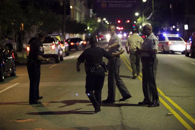Gunman at large after killing nine at black South Carolina church
