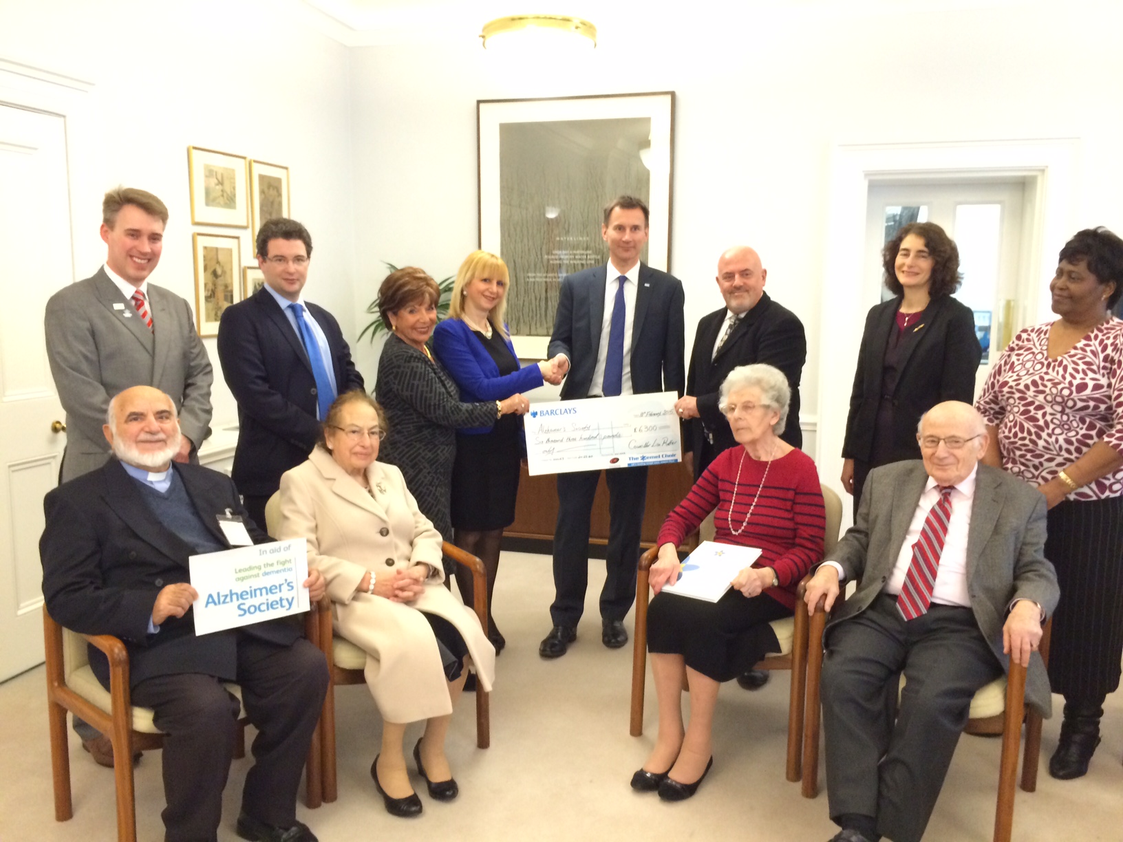 Former Barnet Mayor Councillor Lisa Rutter presents cheque to the Minister of Health
