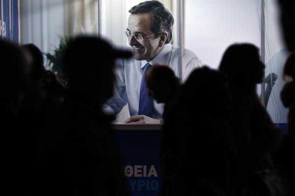 In Greece, new crisis stunts green shoots of hope