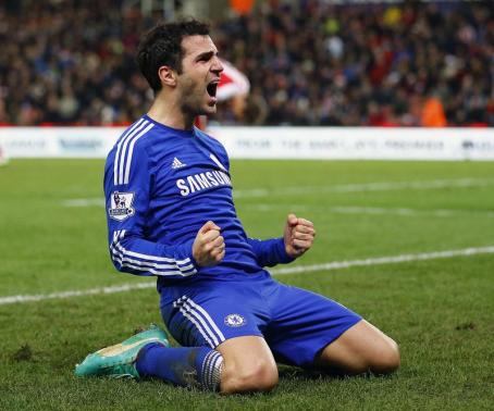 Chelsea go three clear after easing to win at Stoke
