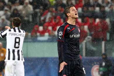 Olympiakos misses chance for win at Juventus