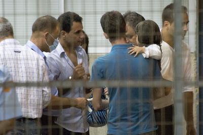 Rescued refugees being transferred to designated accommodation area near Nicosia