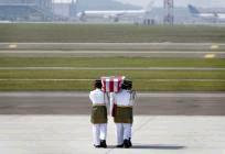 Malaysia mourns as bodies of MH17 victims finally come home