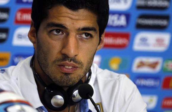 Luis Suarez banned for four months for bite