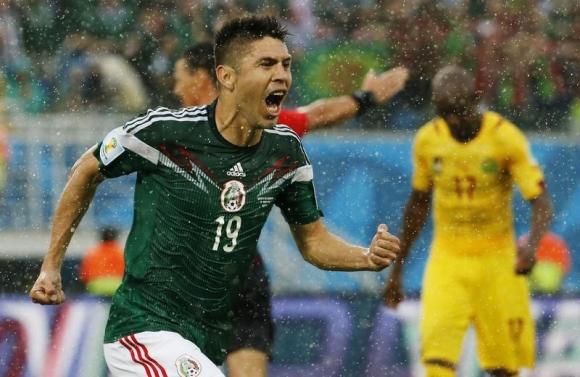 Mexico keep their heads to triumph in Natal rain