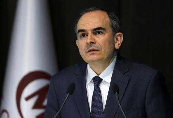 Turkish central bank vows tough action to stop currency tumbling