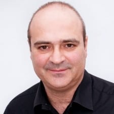 Andreas Koumi manager of Muswell Hill Charity celebrates