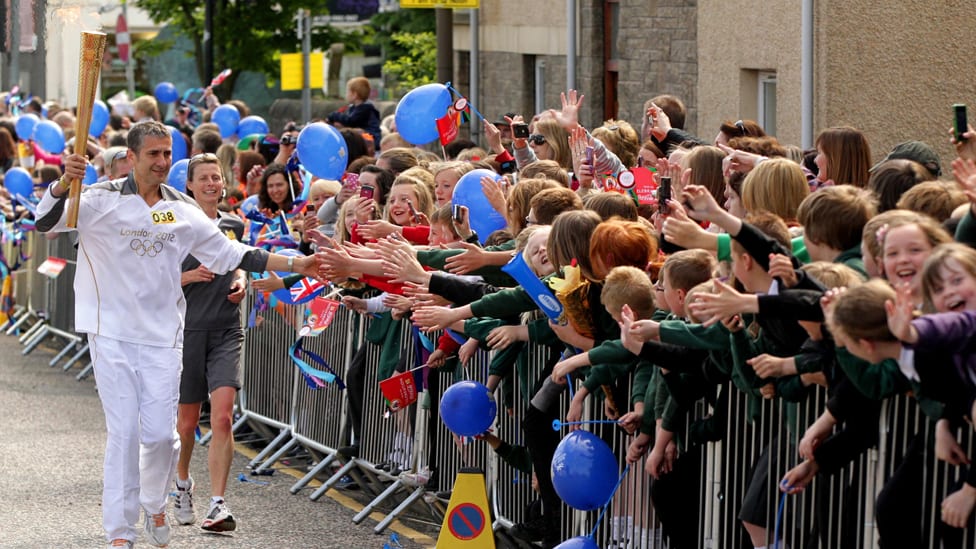 Cypriot carries Olympic flame through Scottish town