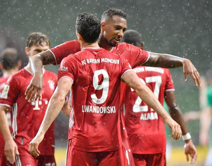 Bayern Munich clinch title behind closed doors