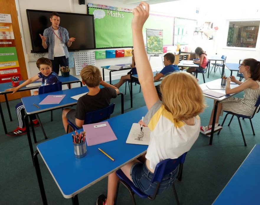 UK government health advisers say missing school is greater risk to kids than COVID