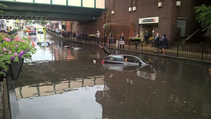 Firefighters feel the effects of climate change as London storms cause widespread flooding