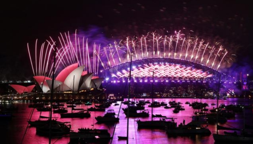 ‘I will survive’: 2020 slinks into history as fireworks light deserted streets
