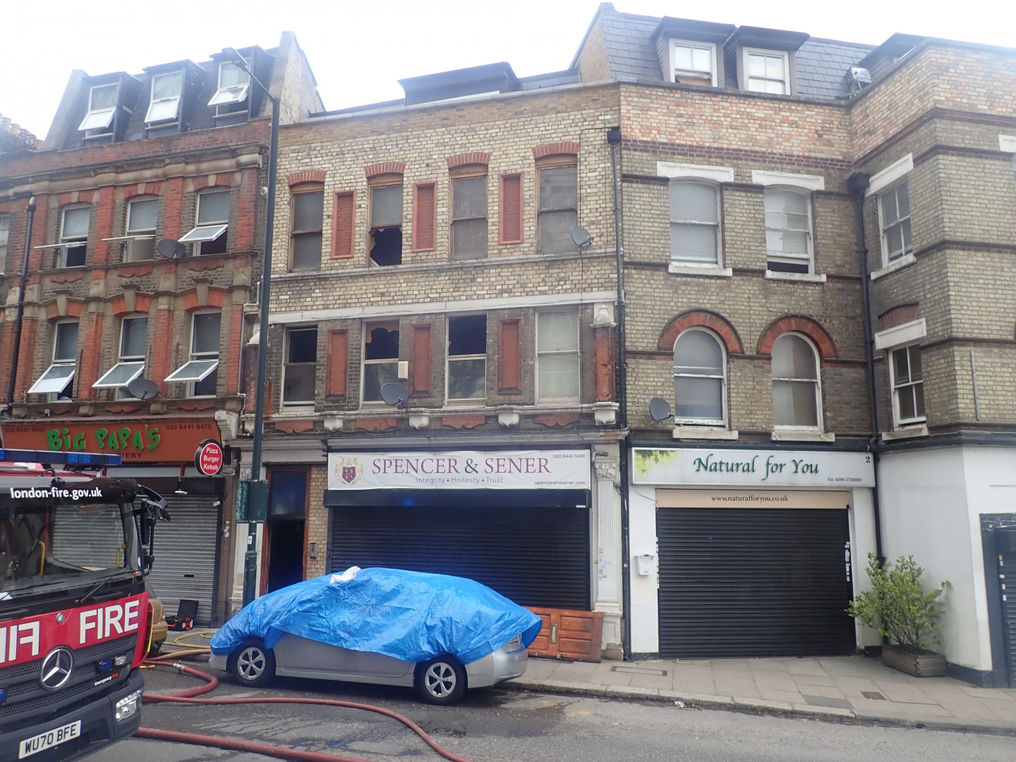 Fire at shop with flats above – Barnet