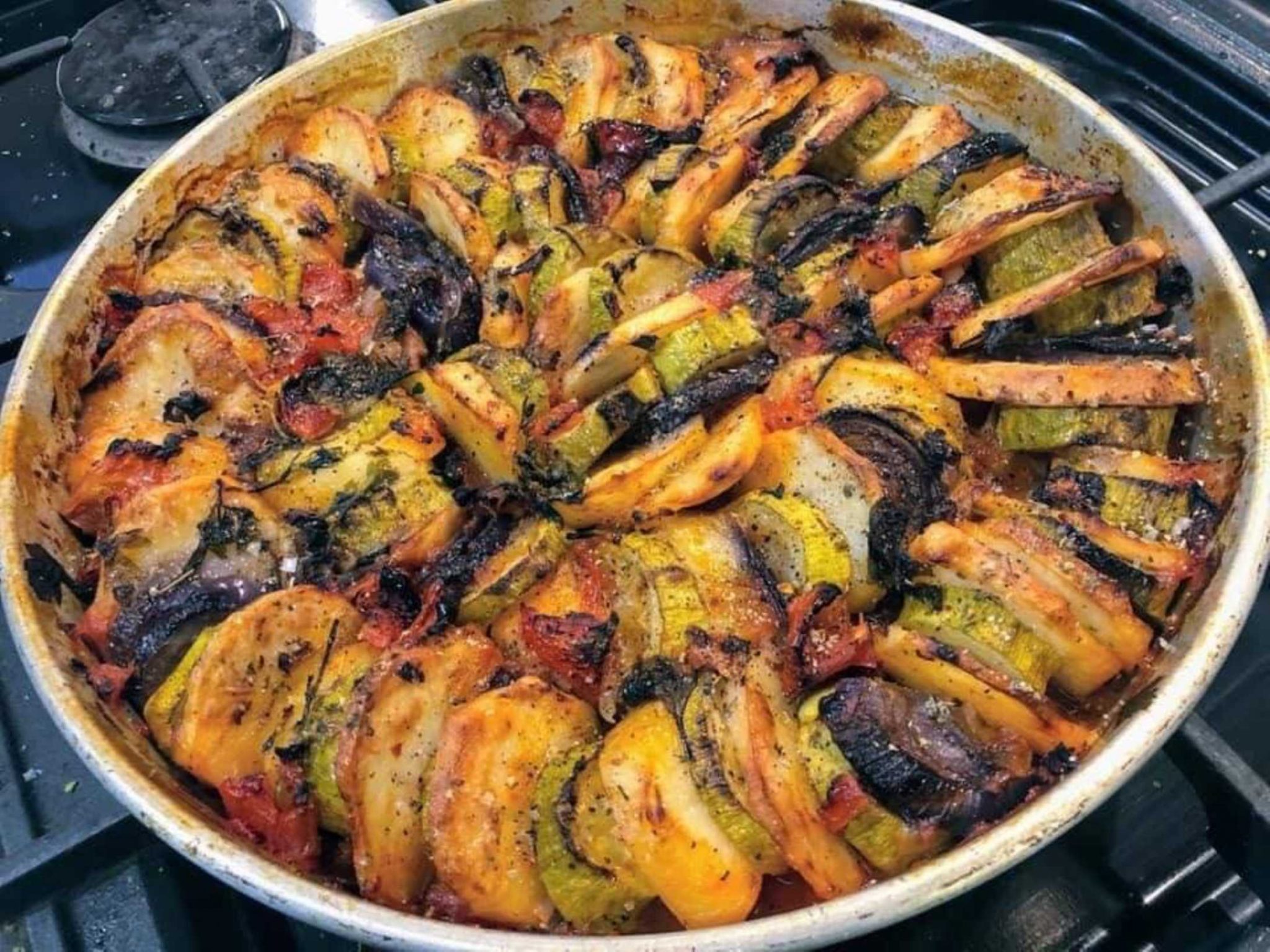 UK Cypriot celebrity Chef shows us how to cook Courgette and potato Bake