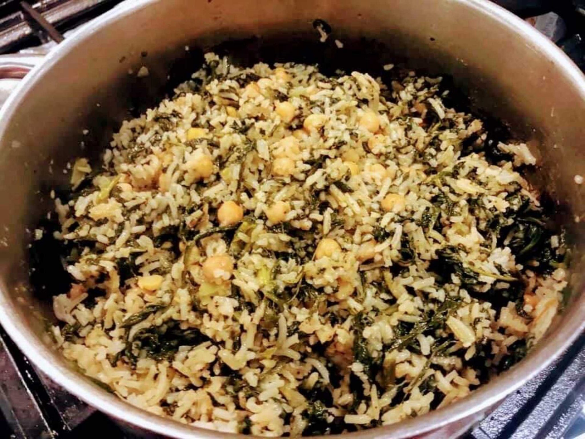 Cooking with UK Cypriot celebrity Chef Loulla Astin Revithospanakorizo (Rice with Chickpeas and Spinach)