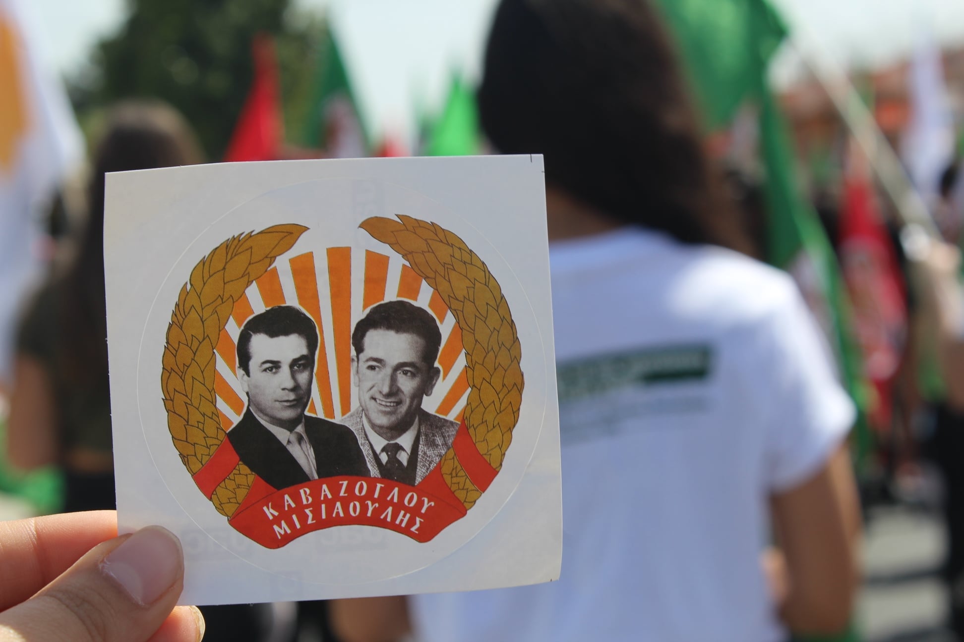 “Honour and glory to our heroes”,”The Turkish Cypriots are not our enemies, the Turkish Cypriots are our brothers”, “Forward for a united and federal Cyprus”