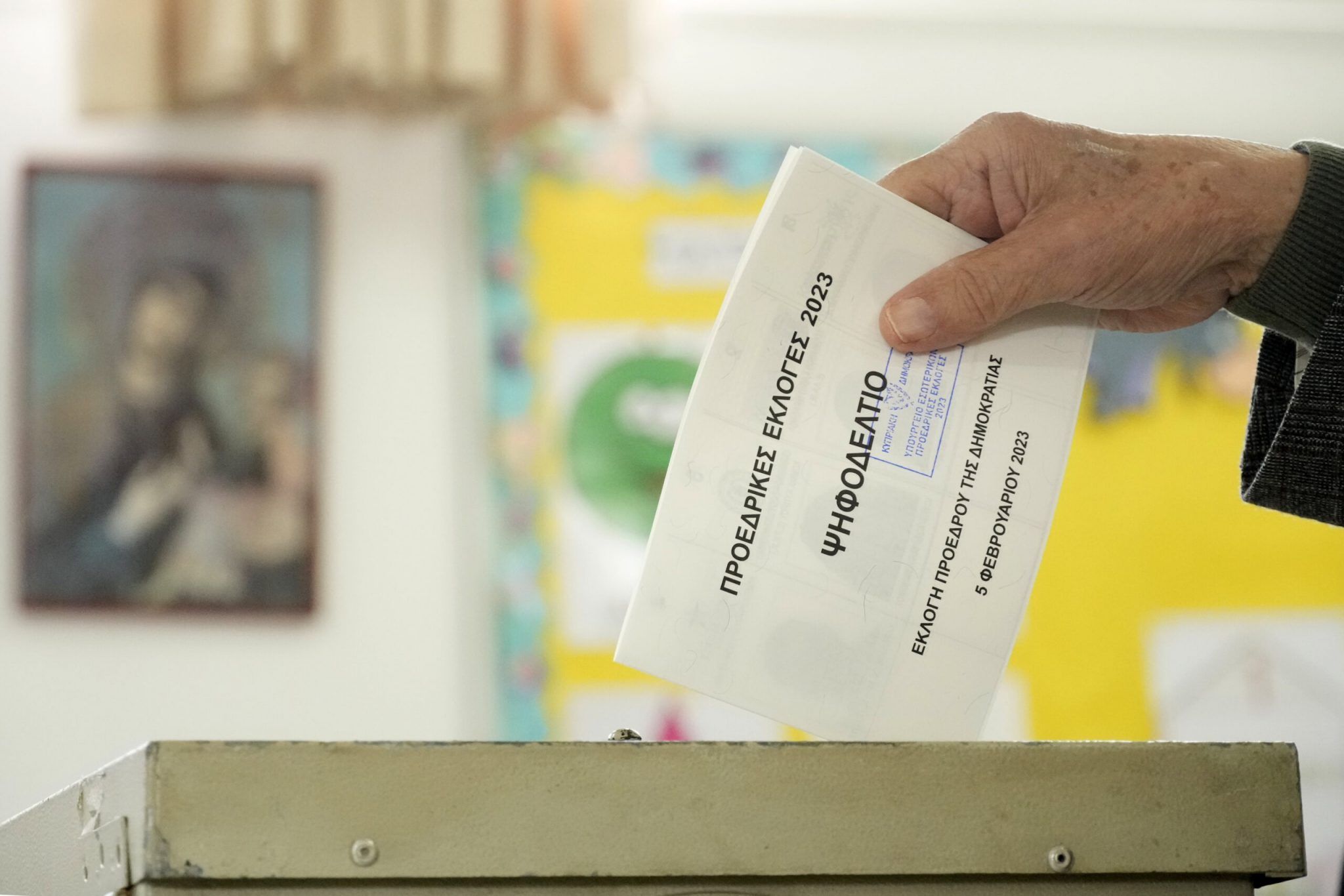 A man casts his vote during the presidential elections in Geroskipou in south west coastal city of Paphos, Cyprus, Sunday, Feb. 5, 2023. Cypriots began voting for their eighth new president in the ethnically divided island’s 62-year history as an independent republic, with three front-runners each portraying themselves as the safest bet to guide the country through turbulent economic times and to seek peace with breakaway Turkish Cypriots.   (AP Photo/Petros Karadjias)