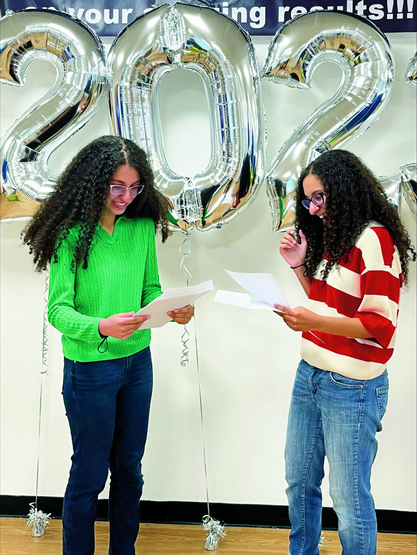 Twins Alexia and Maia celebrate a host of grade 9-7s as they open their GCSE results Pedros and Mathilda celebrate strong results.