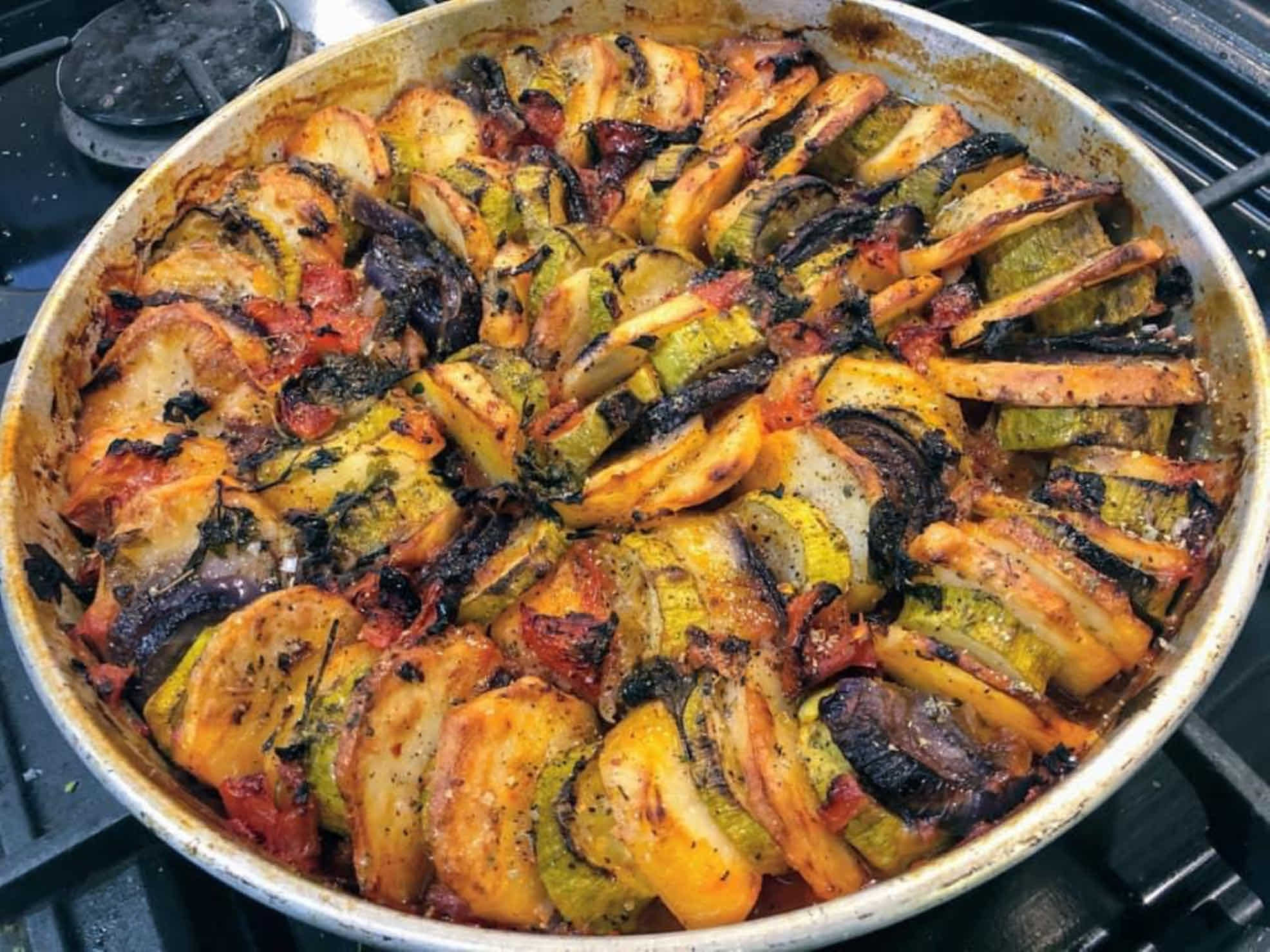 UK Cypriot Loulla Astin cooking Briam with courgettes and potatoes