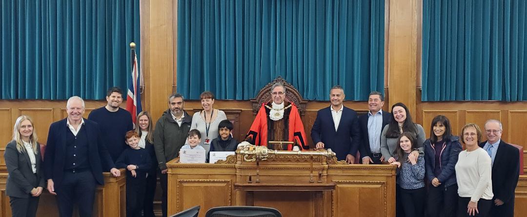 Mayor of Barnet Tony Vourou and John Christodoulou presentations to children from Barnet schools